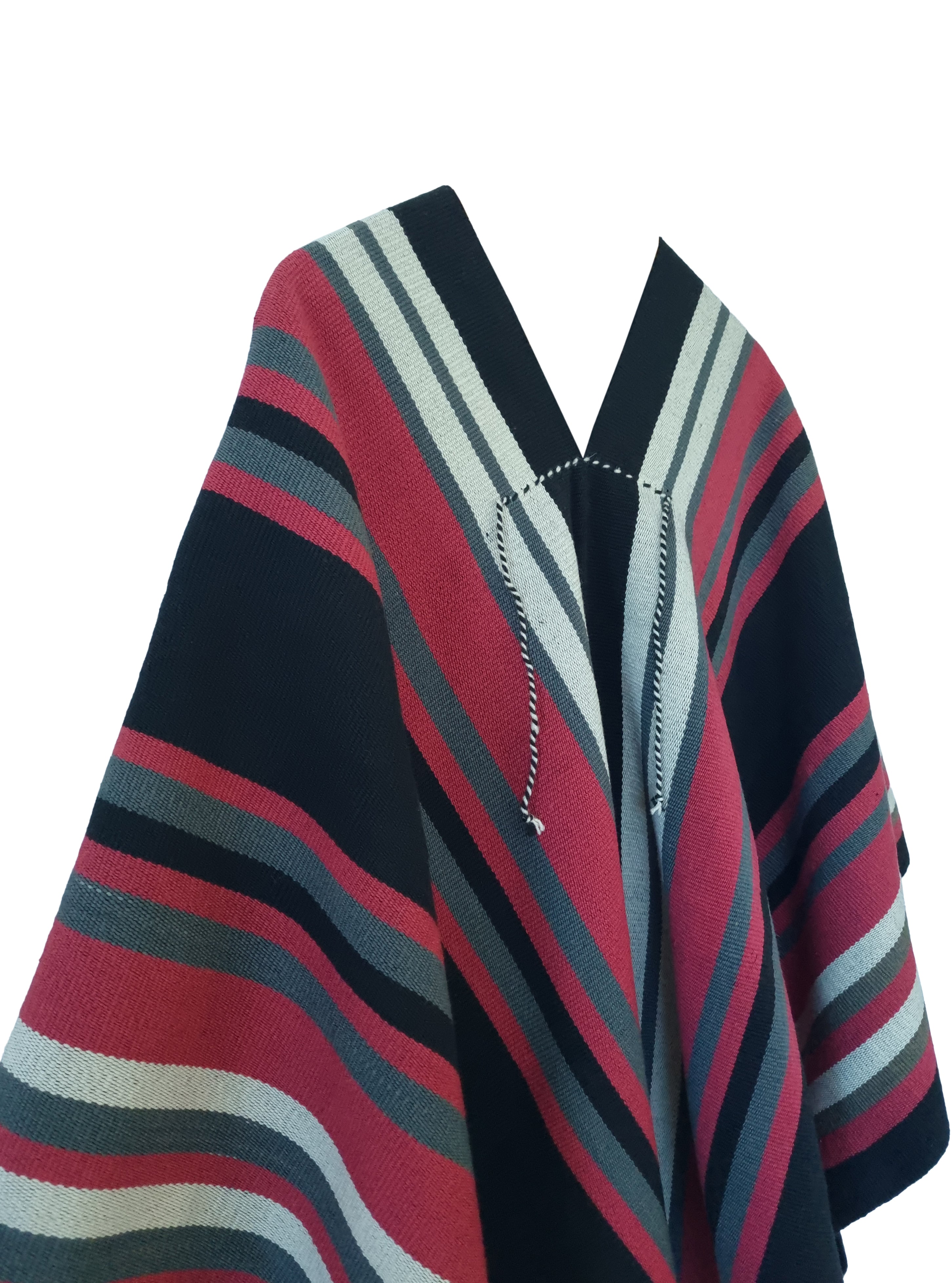 Close-up of Chaltén Listado poncho with red, green-gray and natural stripe details