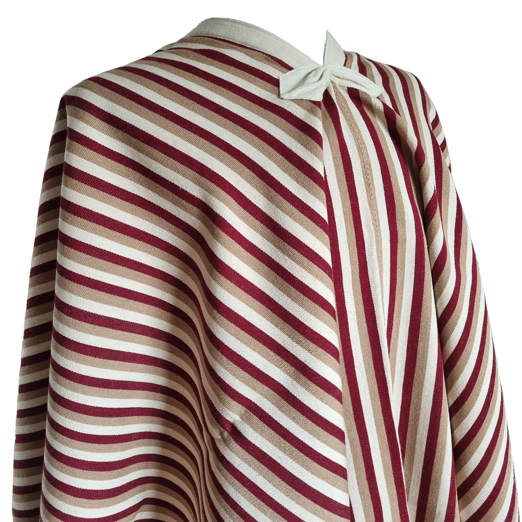 Close-up of Seclantas Salteño poncho with traditional neckline knot