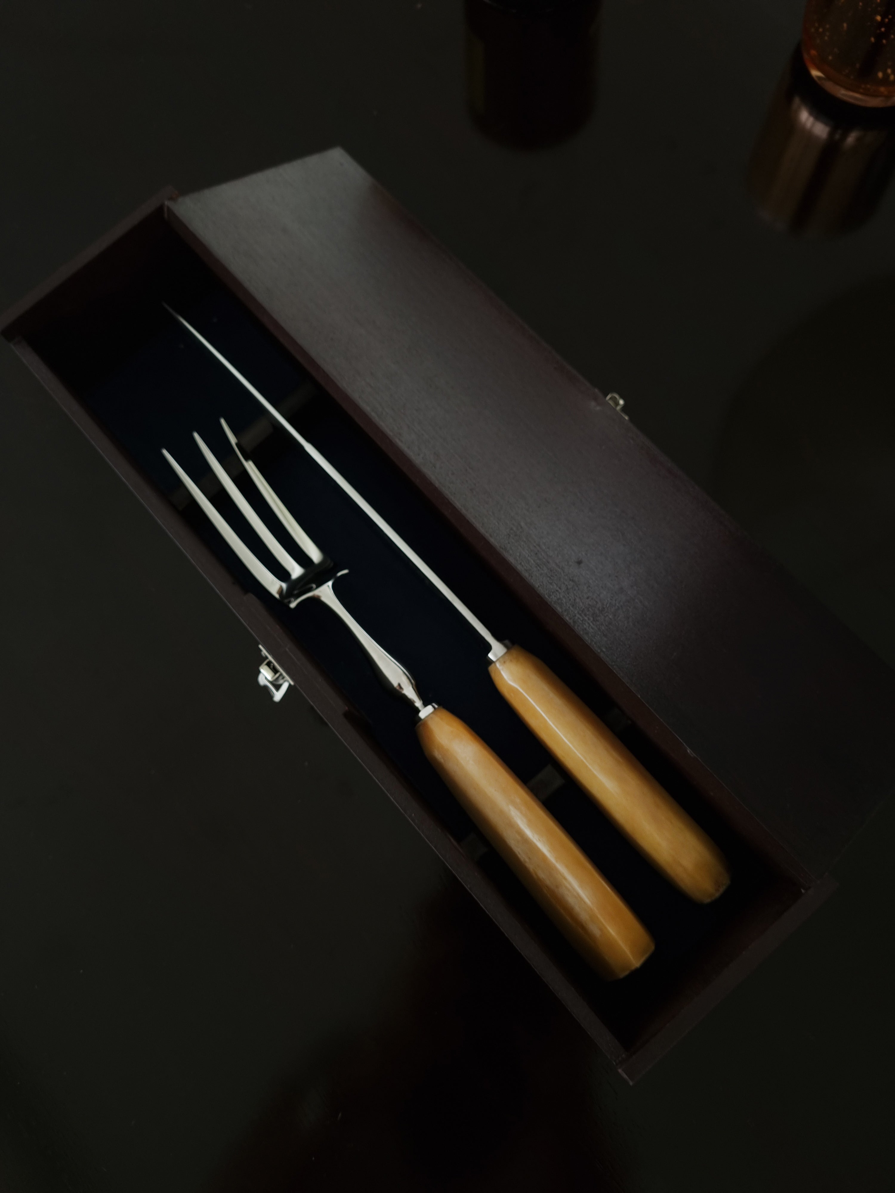 Stainless steel carving knife with 8 inch blade and natural bone handle