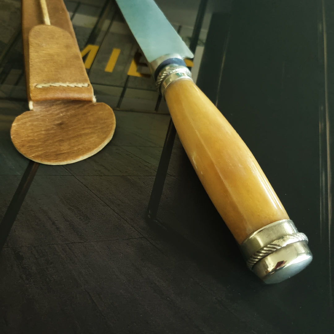 Yellow potro bone knife with alpaca details