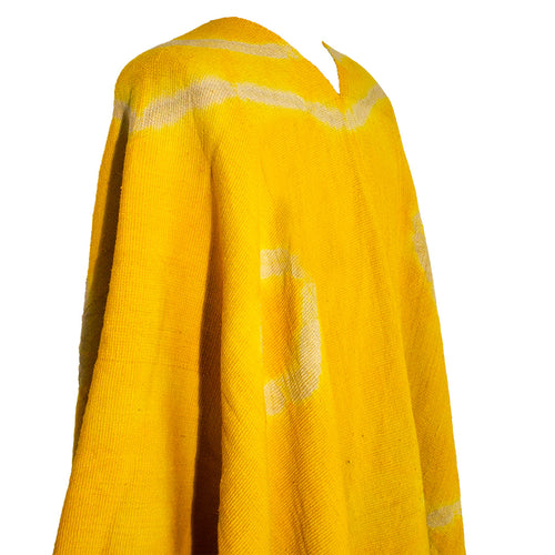 Close-up of Anzulón Argollas poncho with circular tie-dye wool motifs